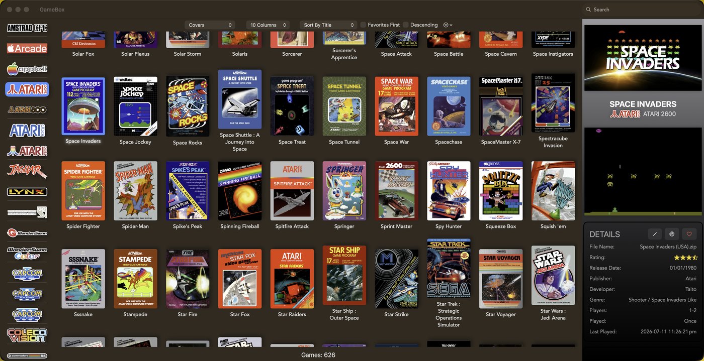 The GameBox window browsing a 626-game Atari 2600 collection as a grid of cover art, with a sidebar of system logos down the left and an info panel on the right showing Space Invaders' marquee, a gameplay video and its full metadata.